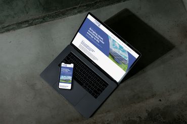 Preview of Solar Panel Cleaning website on device - Website browser on Mac laptop with SPC website open